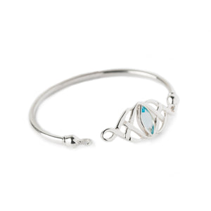 Sterling Silver Celtic Bangle with Blue Topaz